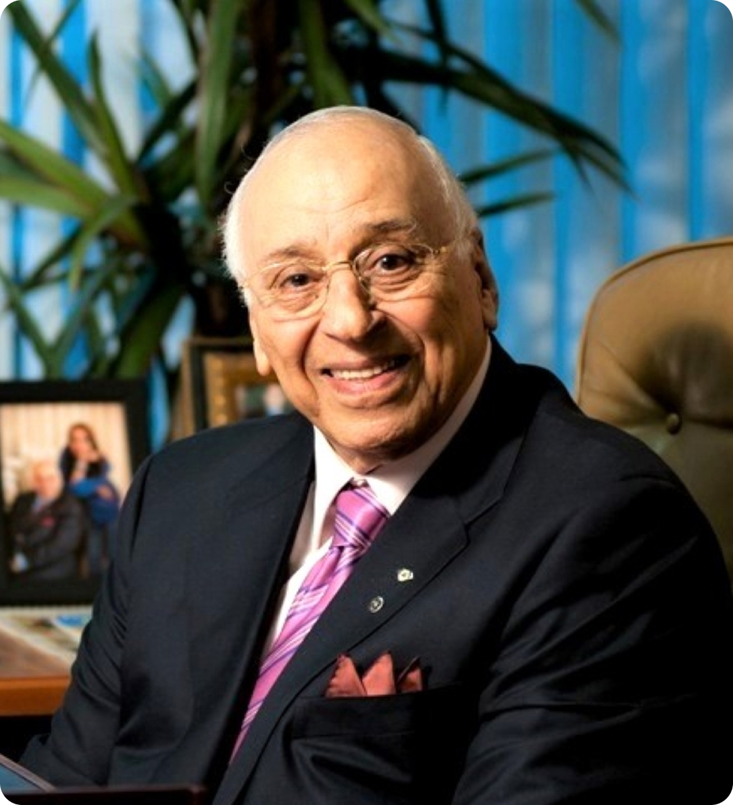 Djavad Mowafaghian sitting at a desk